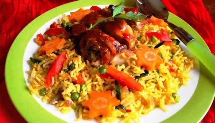 Afbeelding van recept met Moksie Alesie Chicken Parbo (gele rijst met speciaal geroosterde kip)